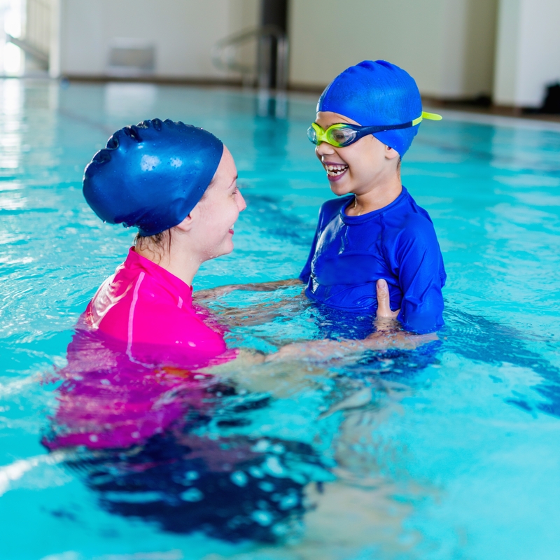 swimming-school-cute-little-boy-having-fun-with-s-2024-10-18-17-47-34-utc